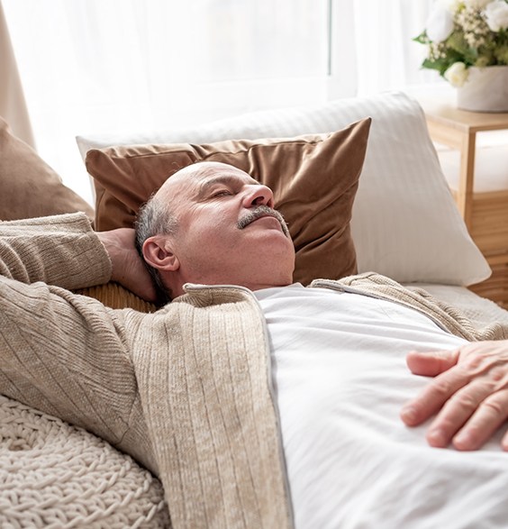 Man resting on a couch