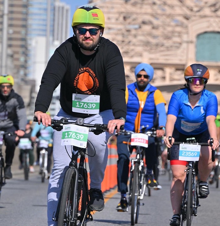 Doctor Yusupov biking in a race